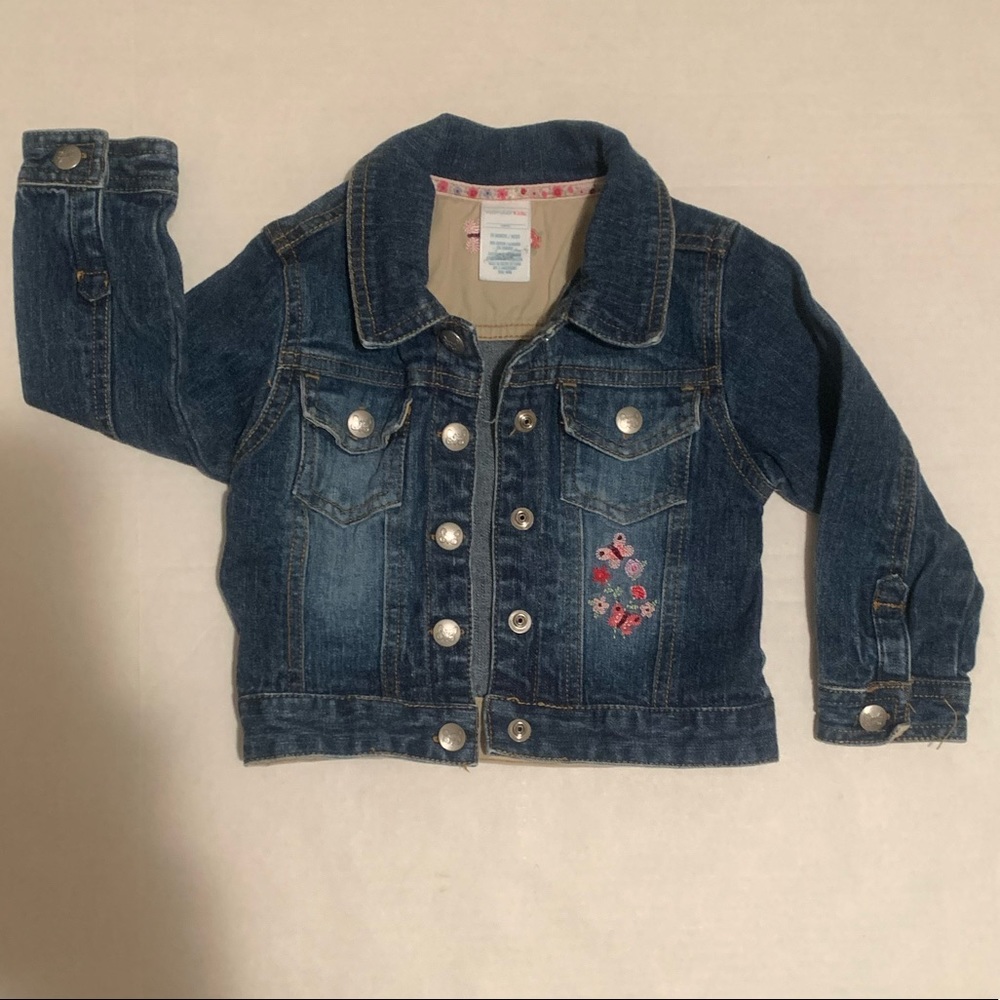 A cute embroidered girls jean jacket in good condition!